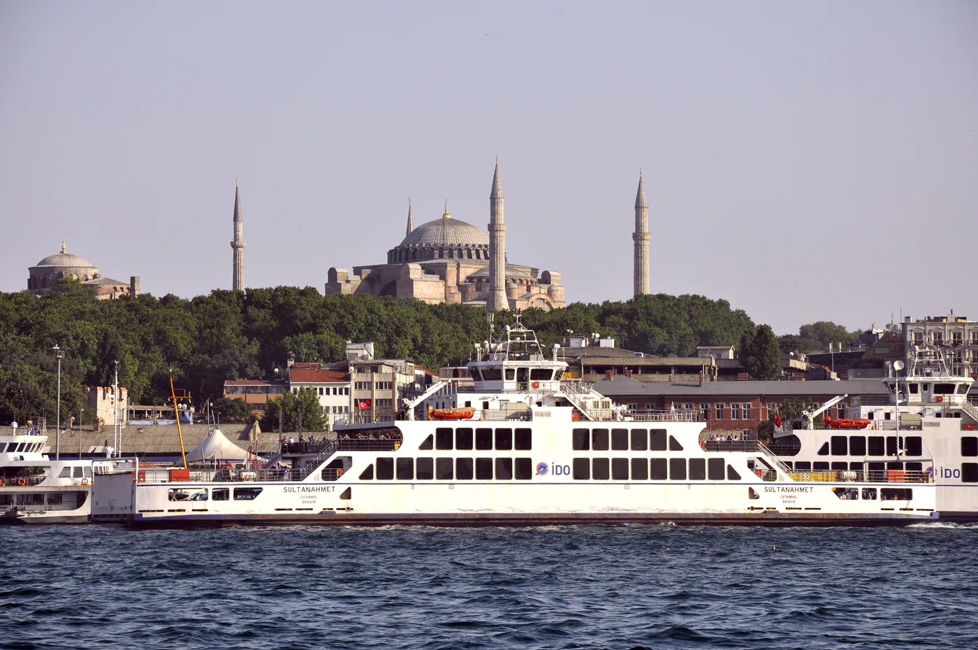 A traditional white passenger ferry making a crossing on Istanbul's Bosphorus