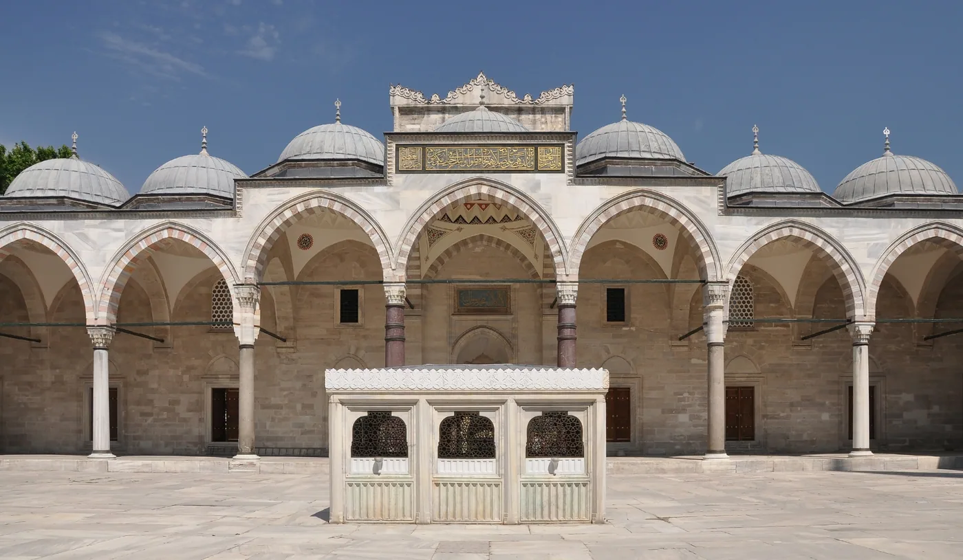 Domes and a courtyard fountain at Süleymaniye Mosque in Istanbul's Fatih district